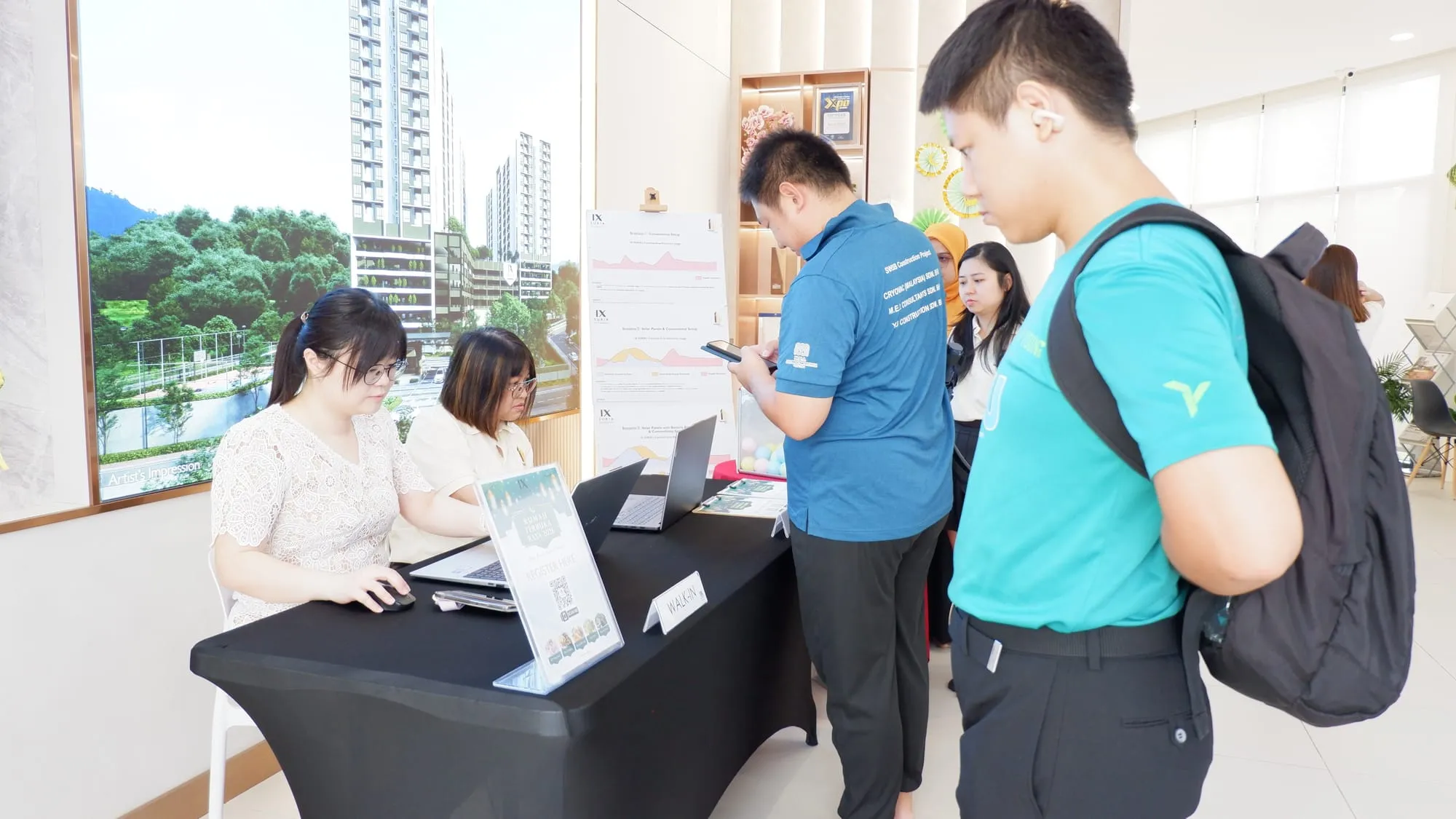 The walk-in desk at the start of the open house, guests waiting to register.