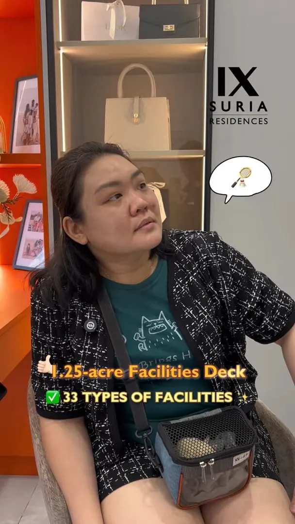 Ms Yip, an IX SURIA buyer, seated in a show unit as she talks about the development’s facilities